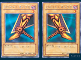 a close up of two cards with different designs on them