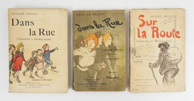 three children ' s books are lined up on a white surface