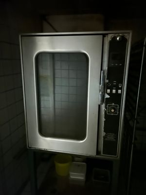 an image of a commercial oven in a dark room
