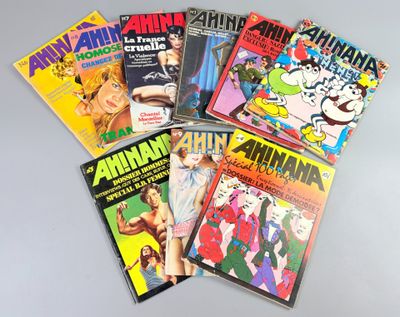 six comic books of various sizes and colors sitting on a table