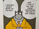 a picture of a picture of a cat in a suit