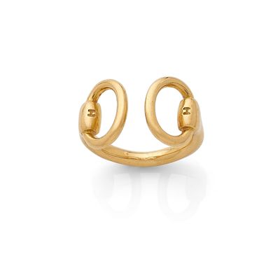 a close up of a gold ring on a white background