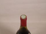 a bottle of wine that is sitting on a table