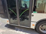 a bus that is parked on the side of the street