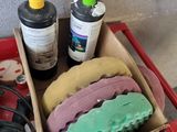 a box full of soaps and other items on a table