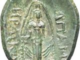 an ancient coin with a woman holding a baby in her arms