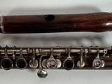 a close up of a musical instrument on a white surface