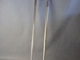 pair of antique silver plated swords with wooden handles