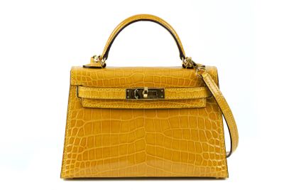 yellow leather handbag on white background with clipping for text