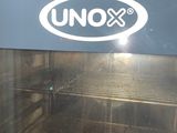 a close up of an oven with a sign on it