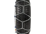 a close up of a tire with chains on it
