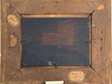an old picture of a wooden frame with a black background