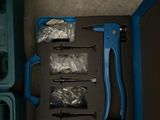 a box with tools in it sitting on the floor
