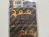 a close up of a package of brake pads on a white surface