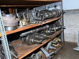 many different types of machinery on the shelves in the room