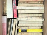 a box full of books sitting on the floor