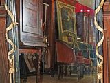 a large mirror that is sitting in a room