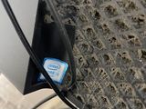 a close up of a bike tire with a blue sticker on it