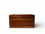 an old wooden trunk on a white surface with a white background