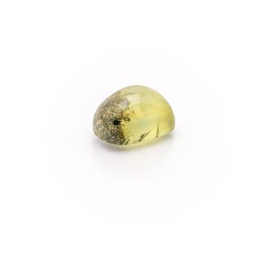 a yellow quartz stone on a white surface