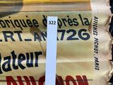 a stack of newspapers sitting on top of a table