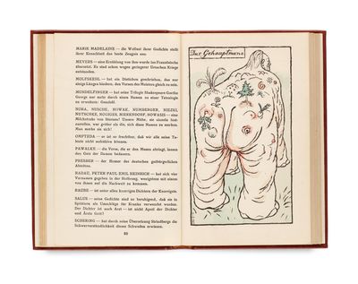 un livre ouvert dont la couverture est ornée d'un dessin représentant un éléphant