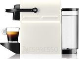 a close up of a coffee machine with a cup of coffee