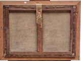 an old wooden easel with a painting hanging on it ' s side