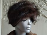 a mannequin with a fur hat on it