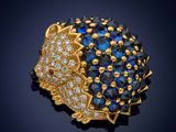 a sapphire and diamond hedge broochle, by van cleef