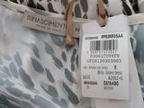 a label on the back of a dress with a leopard print pattern