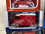 three boxes of toy cars that are sitting on a table