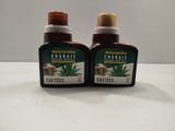 two bottles of naturalide engrais insect repellent on a white table