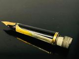 a pen that is sitting on top of a table