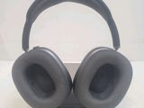 a pair of headphones that are on a stand