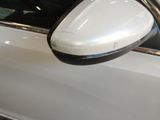 a close up of a car ' s side view mirror