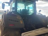 a tractor that is parked in a building