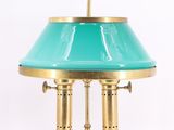 une image d'une lampe de table avec un abat-jour vert