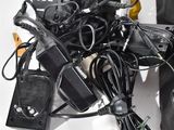 a pile of electronics that is sitting on a table