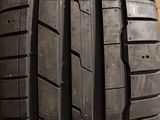 a close up of a tire on a wooden surface