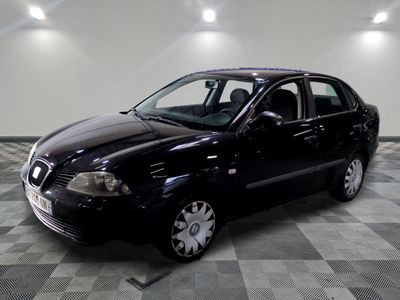 a picture of a black car parked in a garage