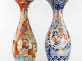 pair of chinese vases on a white background with a white background