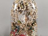 a snow globe with a nativity scene inside of it