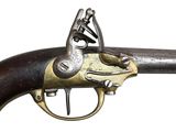 an old gun with a metal handle on a white background