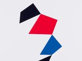 an image of a red, blue and black geometric design on a white background