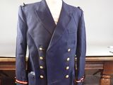 jacket on a mannequin stand on a table in a room