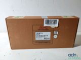 a brown box with a barcode on it sitting on a table