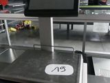 une photo d'une caisse enregistreuse dans un magasin