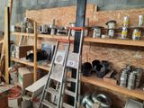 a ladder that is leaning against a wall in a room