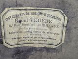 a plaque on the side of a building that says instruments of music to occasions